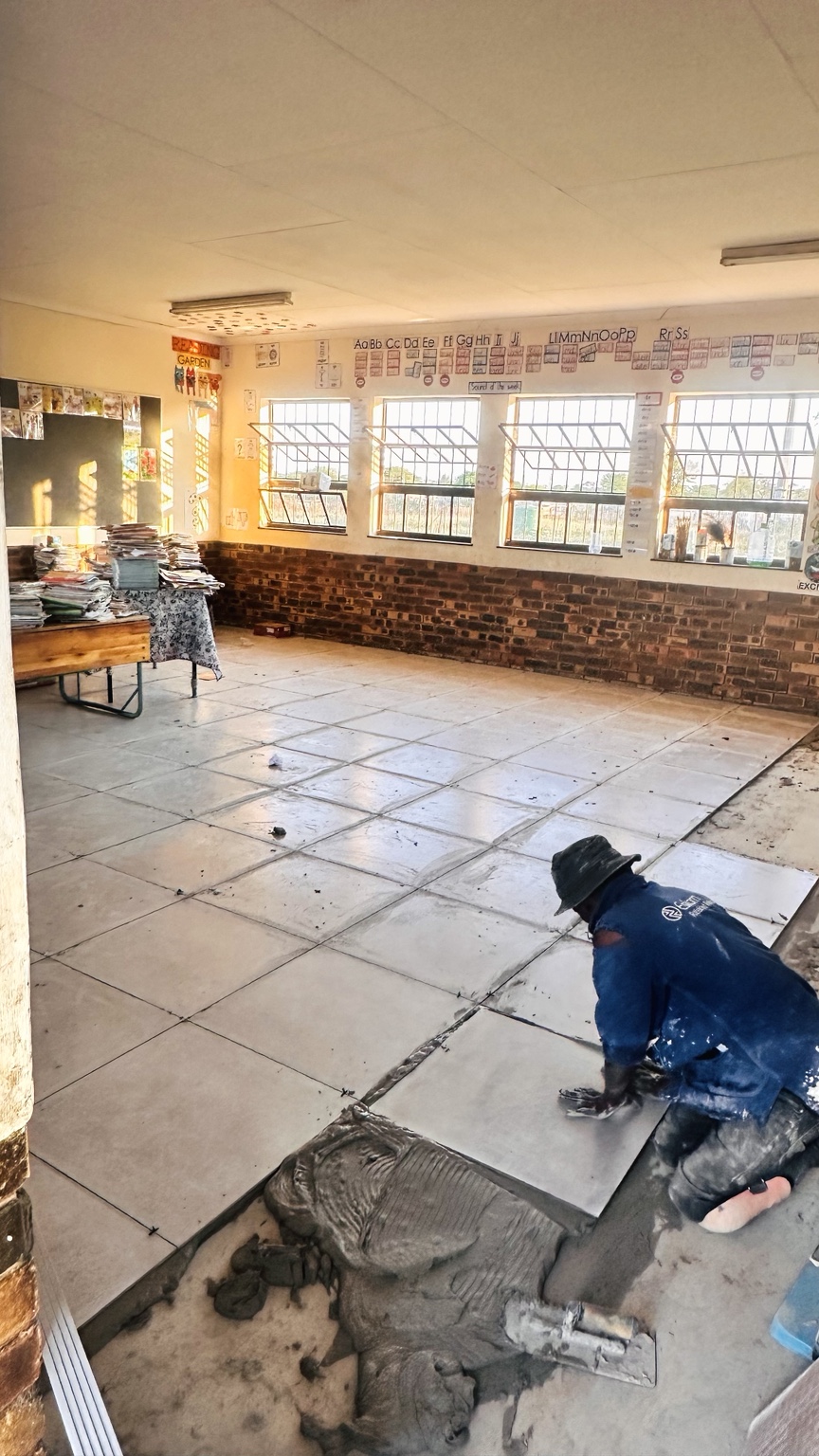 Tiling work in progress inside a classroom at Rathoke Primary School