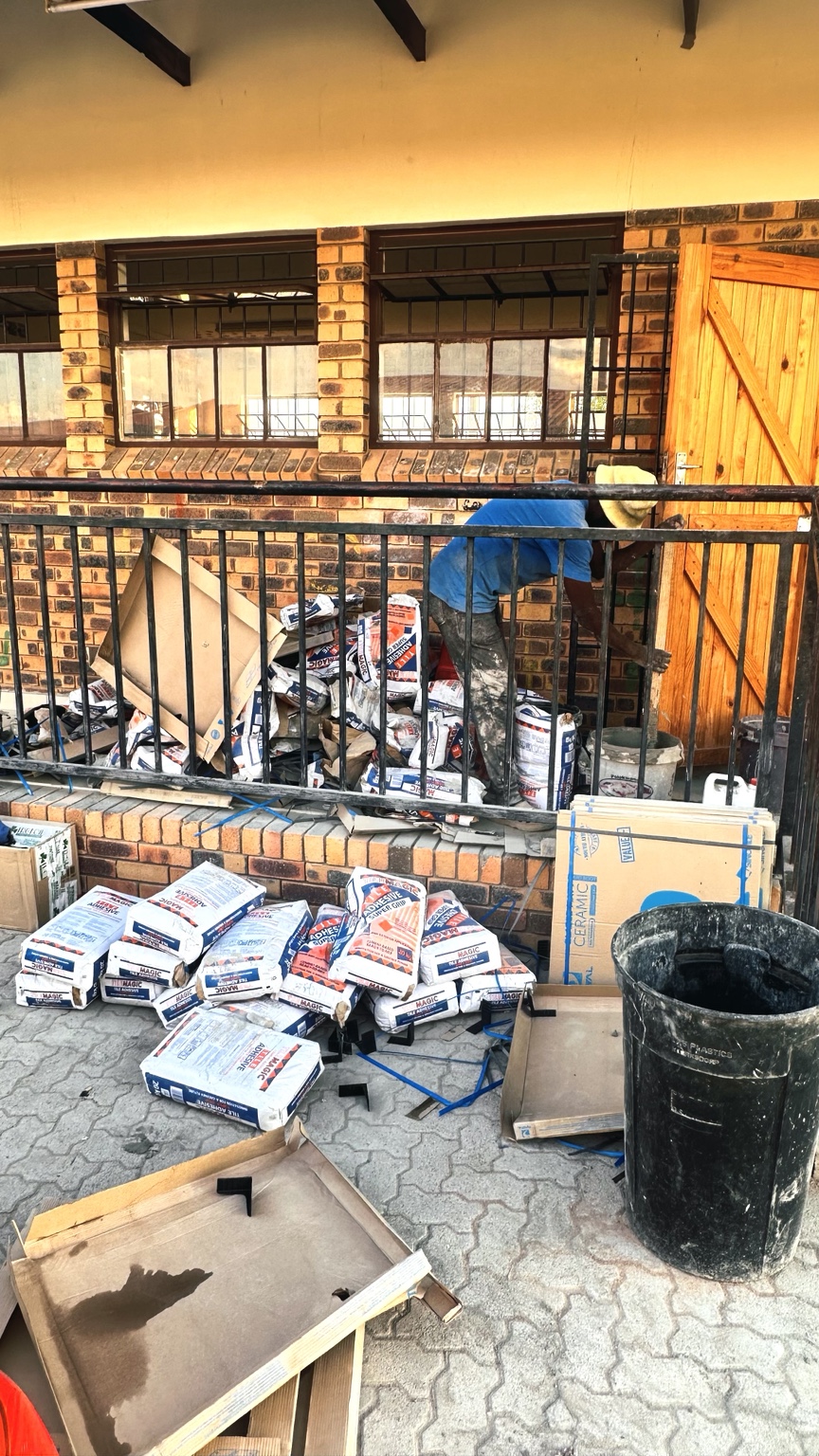 Tile adhesive, tools and supplies on site